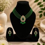 Green and gold beaded necklace set with matching earrings and adjustable dori