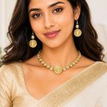 Close-up of traditional Kundan necklace set with circular pendant design