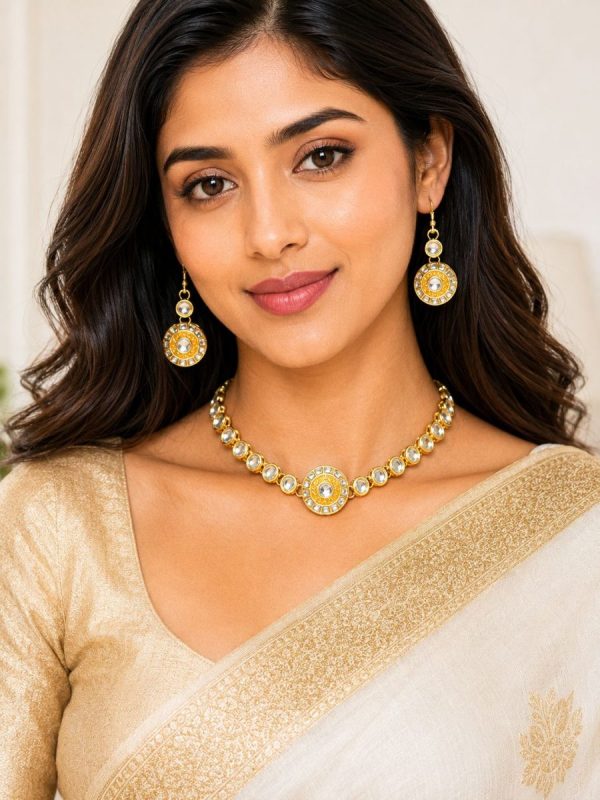Close-up of traditional Kundan necklace set with circular pendant design