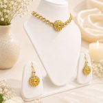 Elegant gold and white Kundan jewellery set for women