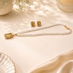 Gold plated pearl pendant jewellery set with matching earrings