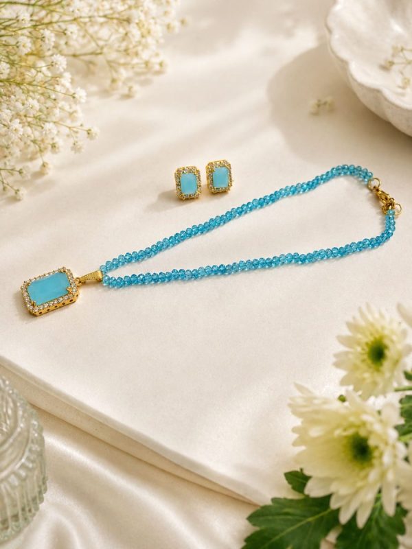 Close-up view of sky blue crystal pendant necklace for women