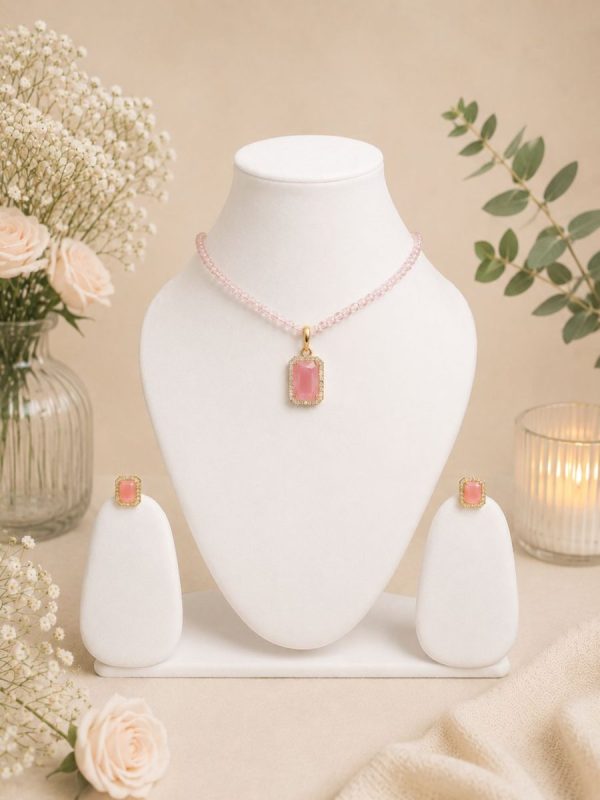 Gold plated pink crystal pendant necklace with pearl bead chain