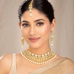 Gold plated Kundan pearl choker necklace set with earrings and maang tikka front view