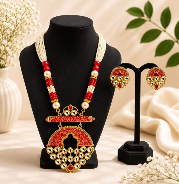 Red beaded Kundan necklace set with matching earrings and pearl strands