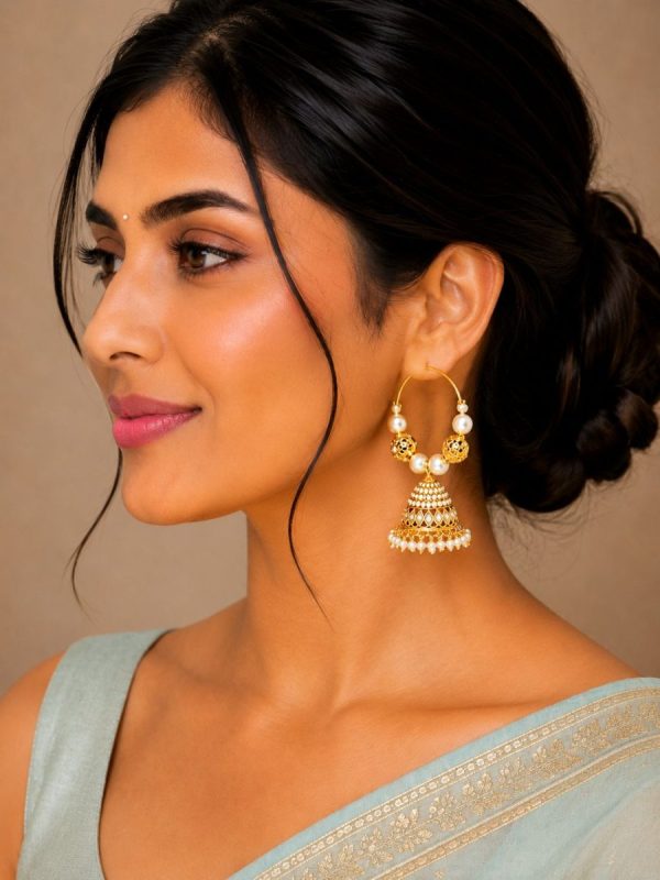 Side view of gold plated pearl hoop jhumka earrings for women