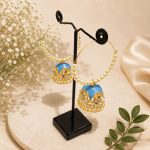 Gold plated blue enamel jhumka earrings with pearl hoop