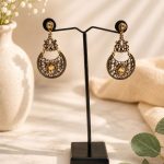 Traditional antique gold earrings with teardrop design