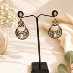 Designer ethnic earrings with white stones and antique gold plating