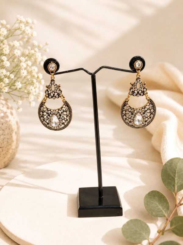 Designer ethnic earrings with white stones and antique gold plating