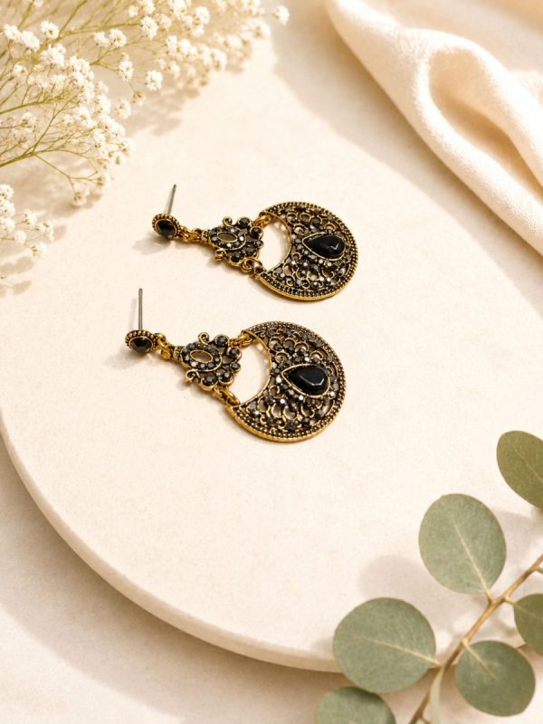 Traditional black stone earrings for women with antique finish-side view on flat
