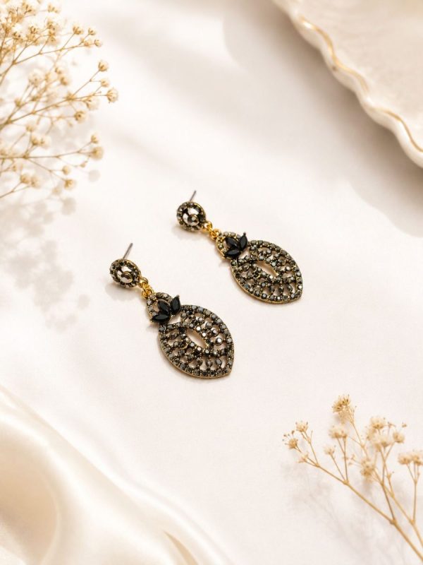 Designer antique gold earrings with black stone detailing