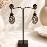 Elegant ethnic earrings with antique finish and black stones