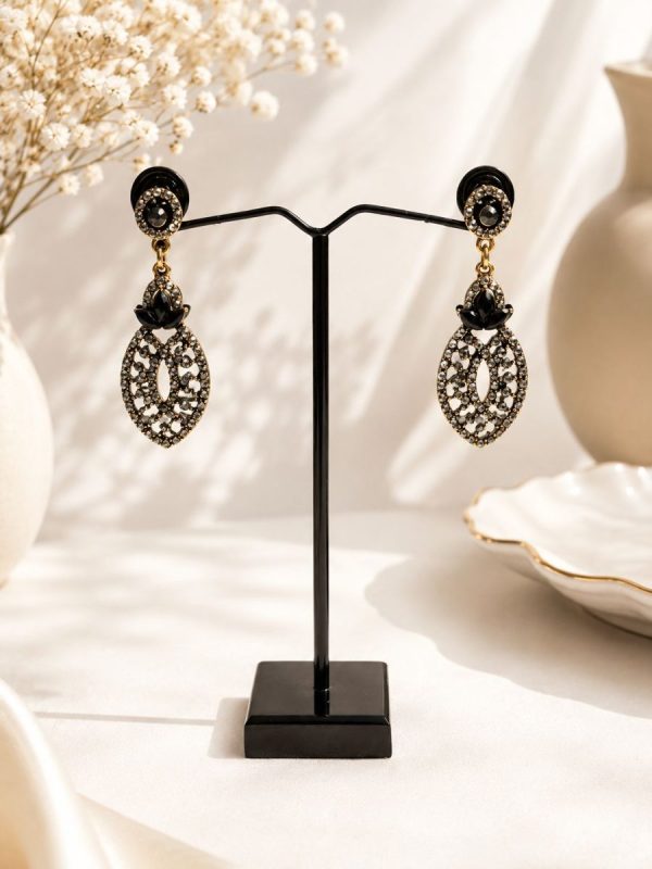 Elegant ethnic earrings with antique finish and black stones