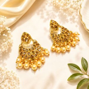 Traditional gold chandbali earrings with pearl hanging design