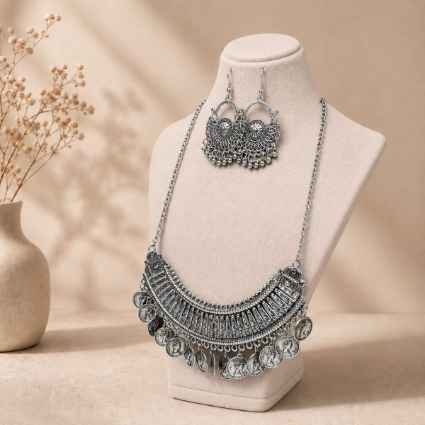 oxidesed coin necklace set on stand side view