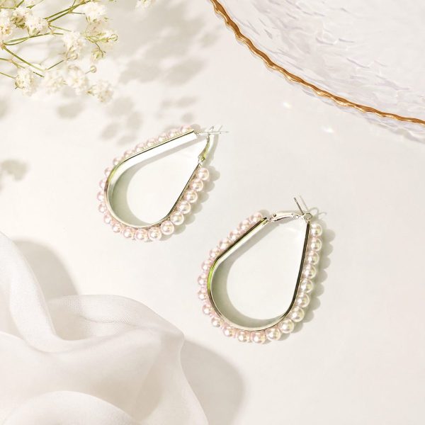 Silver Pearl Hoop Earrings with teardrop design on white background
